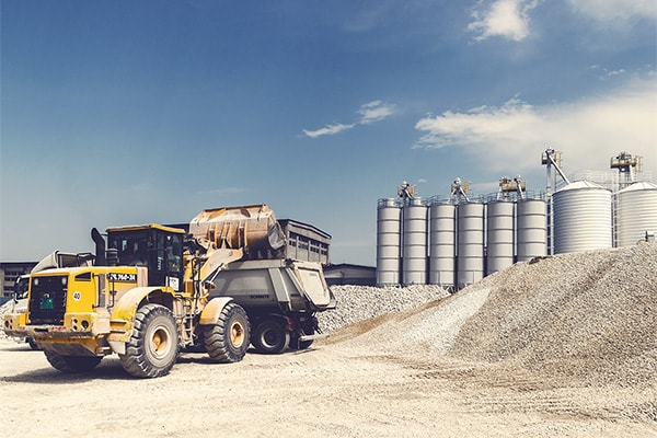 gravel being loaded onto truck